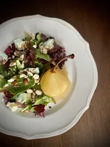 Cider Poached Pears with Greens, Blue Cheese, Toasted Hazelnuts and Cider Reduction Vinaigrette - photo 2